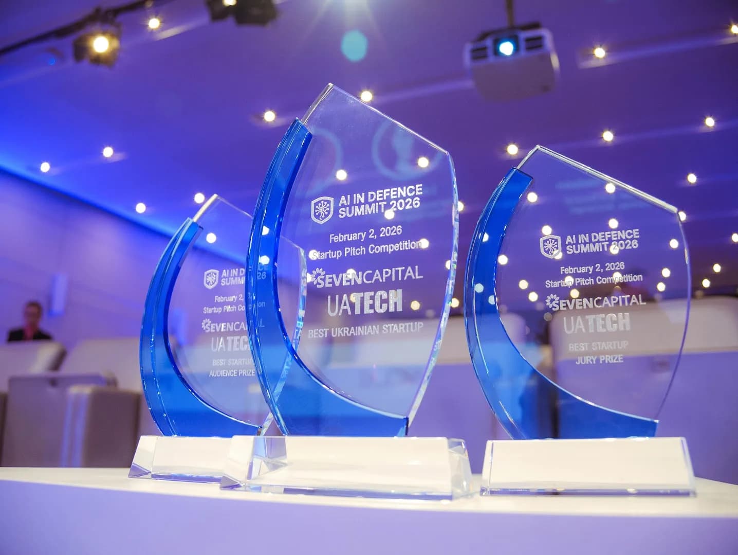 Three glass trophies from the 2026 startup pitch competition